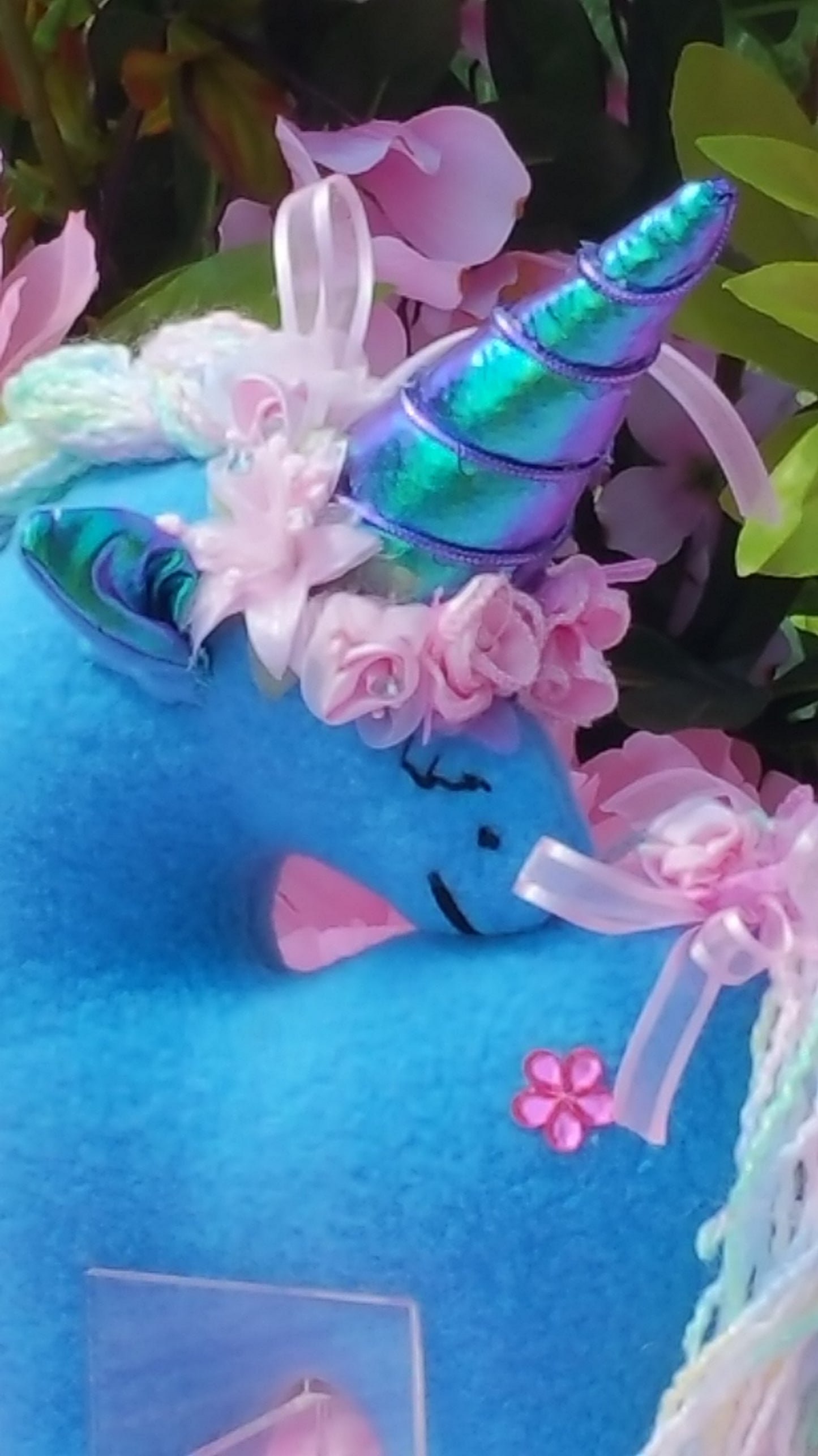 Small Blue Unicorn with Pink Flower Embellishments