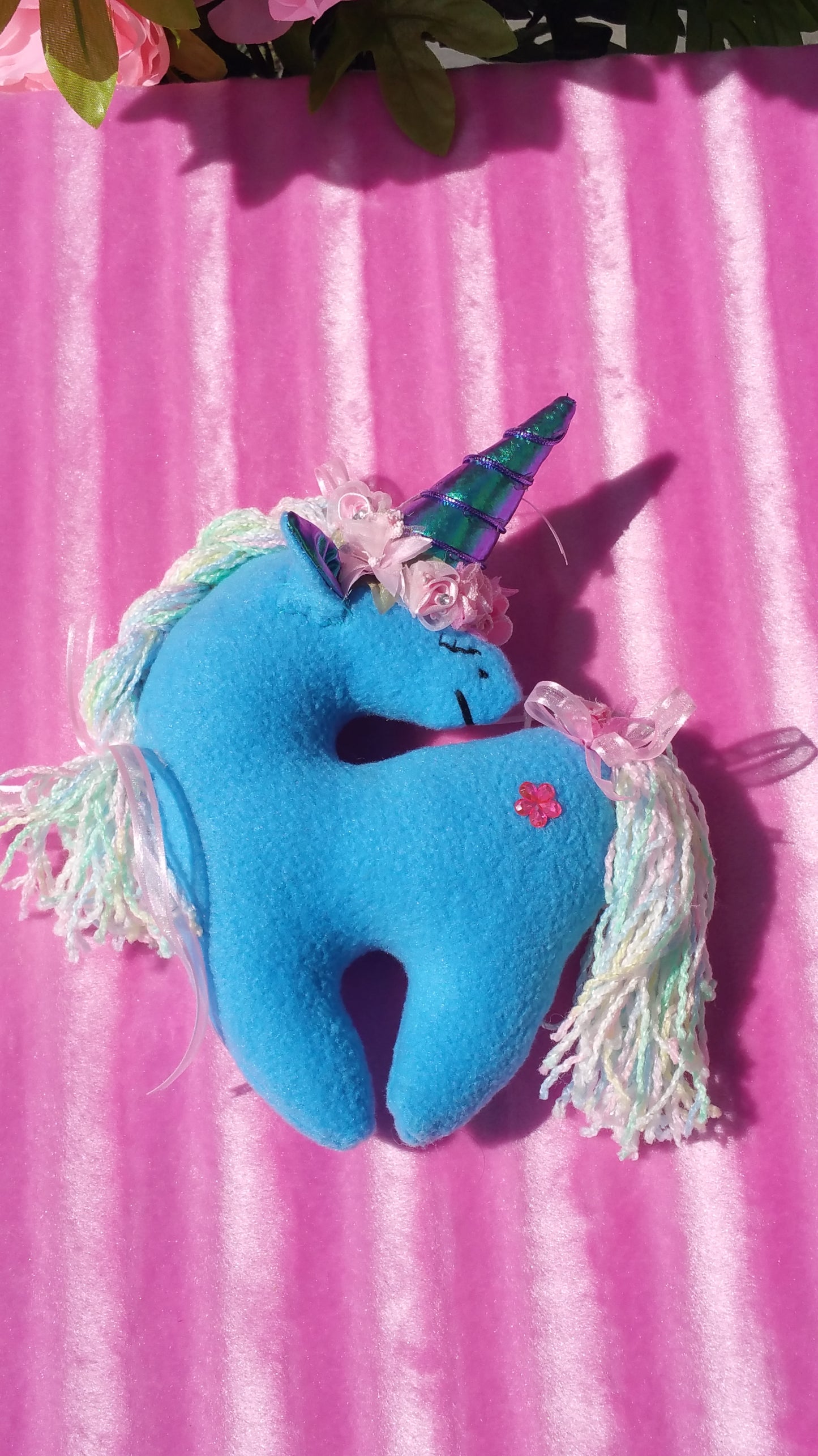 Small Blue Unicorn with Pink Flower Embellishments