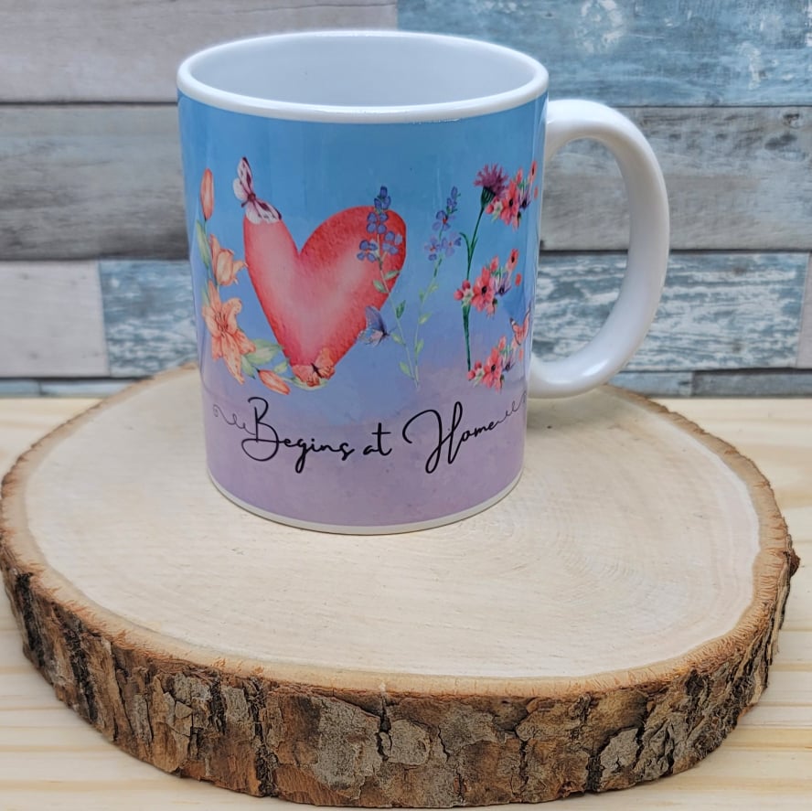 Love Begins At Home Mug